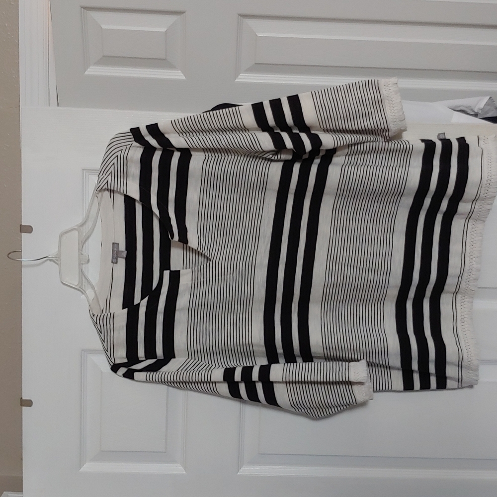 Black and white striped top with fringe